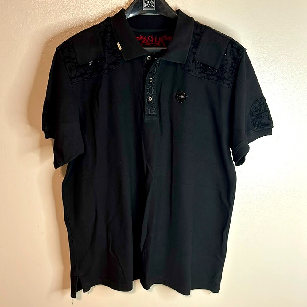 Crown Holder Authentic men’s Polo Shirt size Xl in exchange condition.